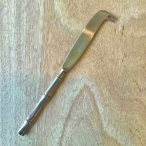 Elegant Brass Cheese Knife with Bamboo Pattern Handle